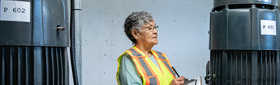 IR--female-utility-worker-in-pumphouse